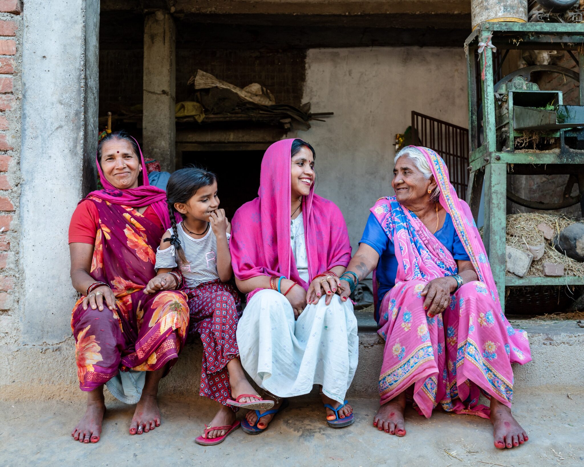 4 generations of women in Nepal: grandmother, mother, daughter and granddaughter